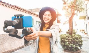 Female online influencer making a selfie viral video 
