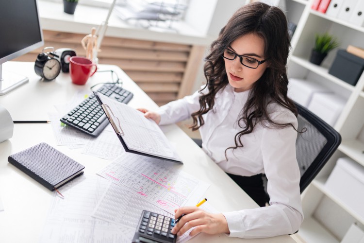 An accountant prepares a financial report.