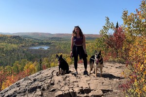 Lexy Vreeland on a hike with her two dogs.