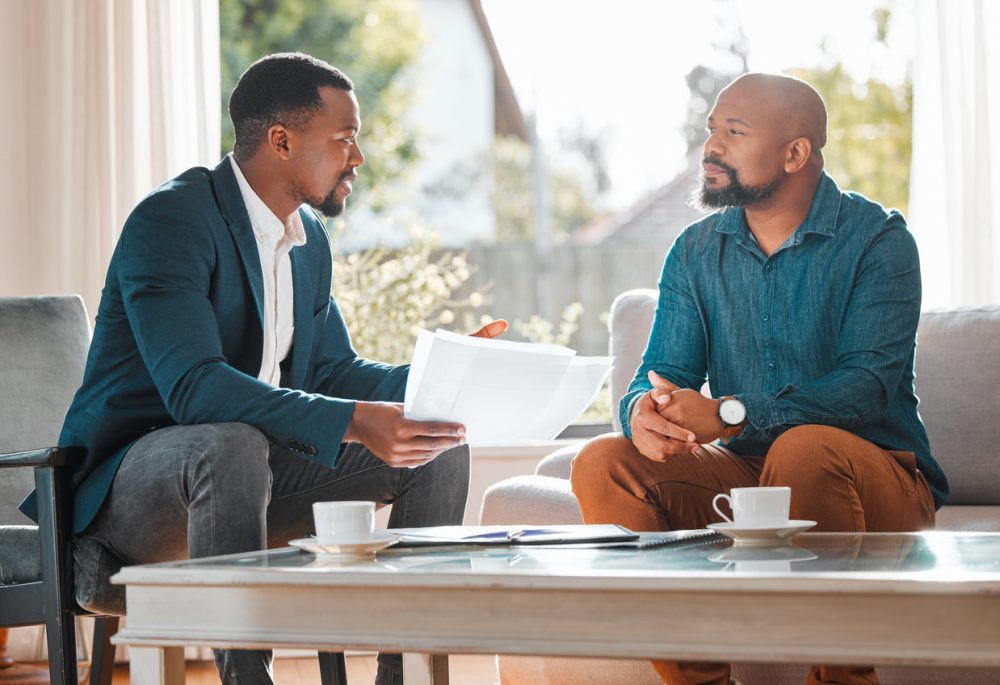 A financial advisor works with a client.