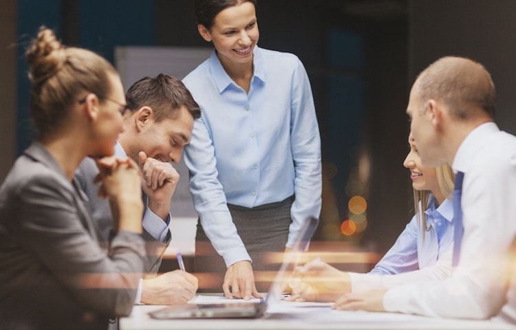 finance professionals meeting around conference table