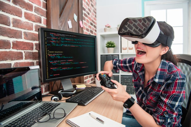 A video game developer tests a VR program