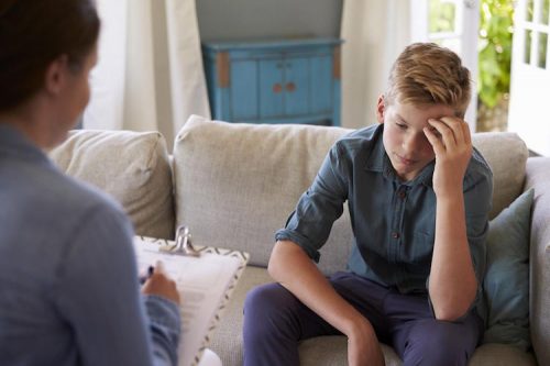 boy with depression addressing mental health