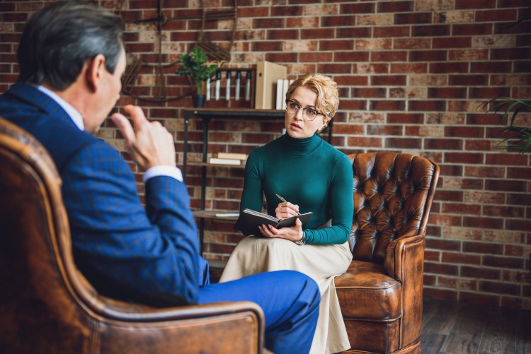 A psychologist interviews a client.